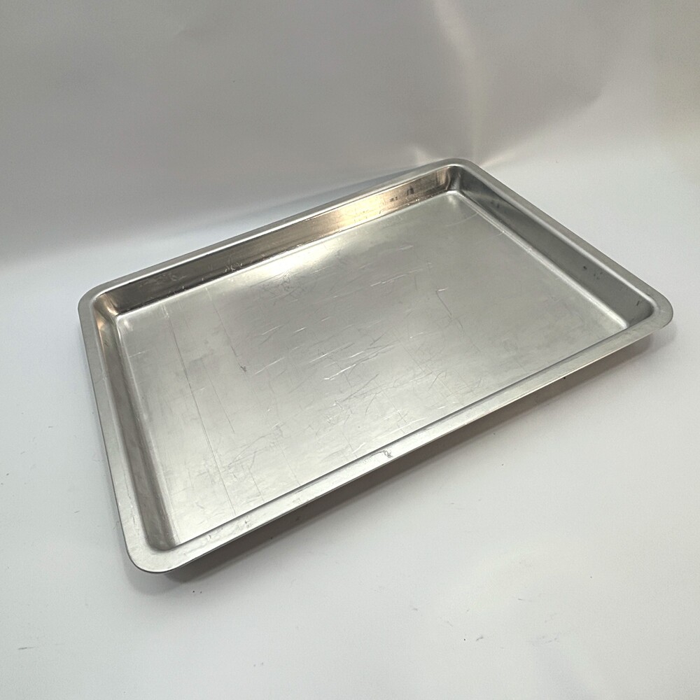 Rectangular Metal Baking Sheet with Raised Edges and Embossed Bottom